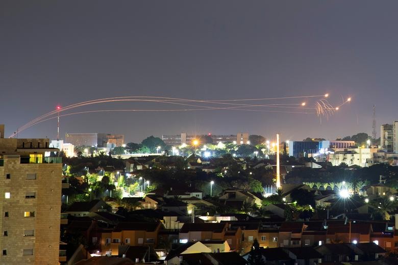 The Iron Dome anti-missile system fires interception missiles as rockets are launched from Gaza towards Israel, as seen from the city of Ashkelon, Israel. REUTERS/Amir Cohen    